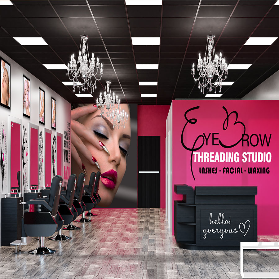 Modern eyebrow threading studio interior with pink branding and reception
